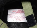 a label on the back of a military hat