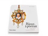 a book with a picture of a man in a gold frame