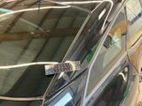 a remote control attached to the side of a car