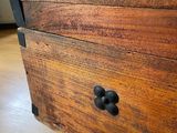 a wooden box that has a handle on it