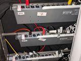 a bunch of wires that are connected to the back of a speaker
