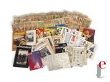 a pile of old newspapers sitting on top of each other