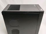 the front of a black computer case sitting on top of a white surface