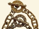 a close up of a chain with a clock on it