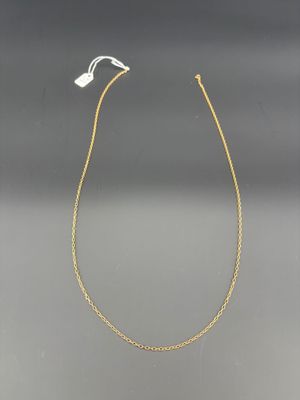 un collier à chaîne en or orné d'un seul diamant