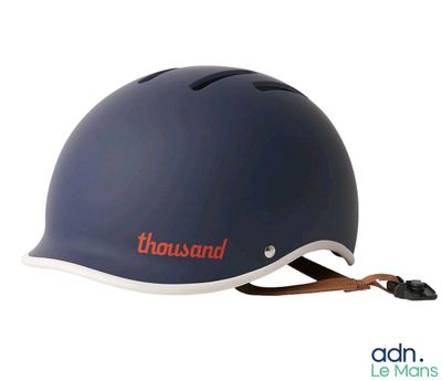 a blue helmet with the word thousand on it