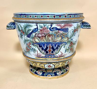 a large blue and white vase with a bird on it