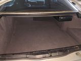 a trunk of a car with the back door open
