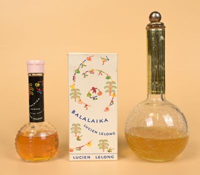 a bottle of liquor next to a bottle of liquor