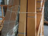 a large pile of boxes on a pallet in a warehouse