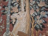 a close up of a tapestry with a horse on it