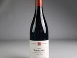 a bottle of wine that is sitting on a table