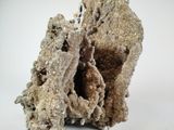 a piece of rock that looks like it has a hole in it