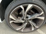 a close up of a tire on a car ' s rim