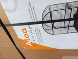a box that has a bird cage on top of it