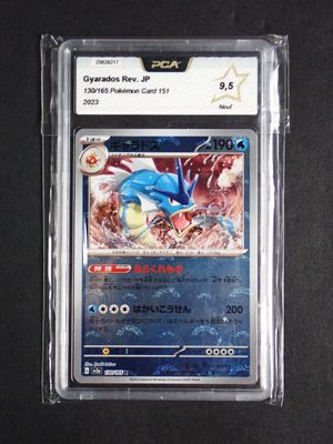a close up of a pokemon card in a plastic case