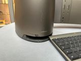 a computer keyboard and a mouse on a table