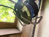 a hose attached to the side of a building