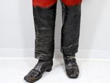 an image of a pair of black boots with red pants