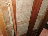 a picture of a room with wood floors and a window