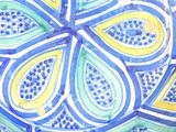 a painting of a blue, yellow and green flower on a plate