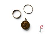 two rings and a ring with a picture of a woman on it