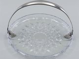 clear glass serving dish with a handle and handle