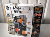 a box that has a juicer in it on a table
