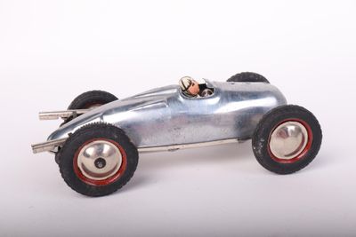 a silver toy car with red wheels on a white surface
