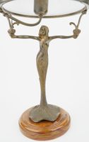 Lampe en bronze à décor de femme nue et jupe feuillage (photo 2)