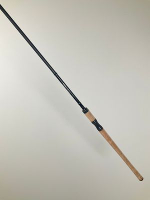 a close up of a fishing rod on a white background