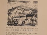 an old book with a picture of a town on it