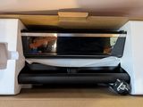 a box with a microwave inside of it on a table