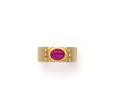 an oval ruby and diamond ring