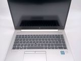 a laptop computer that is sitting on a table