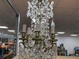 a chandelier hanging from a ceiling in a room