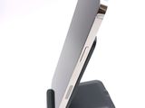 a close up of a cell phone on a stand