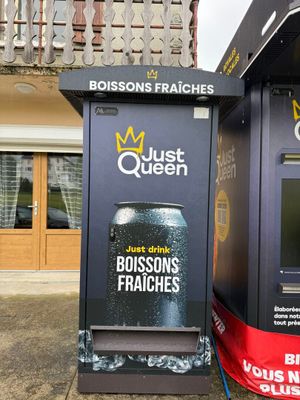 two vending machines on the side of the street