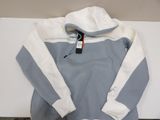 a blue and white hoodie with a white hoodie on it