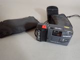 a black camera and a black bag on a table