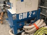 a large box of hoses sitting on top of a cart in a warehouse