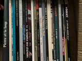 a box full of books that are sitting on the floor