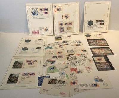 a lot of stamps and postcards on the table