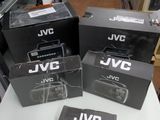 three boxes that are sitting on a table in a store