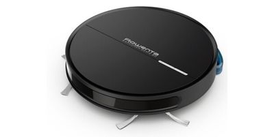 gros plan d'un aspirateur robot sur une surface blanche