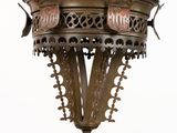 a hanging lamp that has a bird on top of it