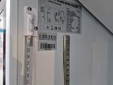 a close up of a white refrigerator with a label on it