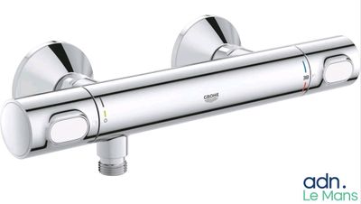 a close up of a shower faucet on a white background