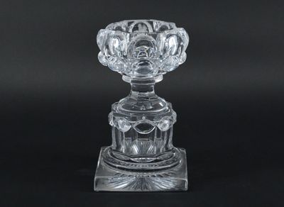an image of a clear glass vase on a black background