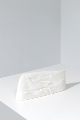 sculpture of a white rectangular object on a white surface